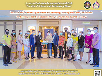 Dean and staff of the faculty of science
and technology handing over a New Year's
basket to the vice president for
academic affairs, Suansunandha rajabhat
university